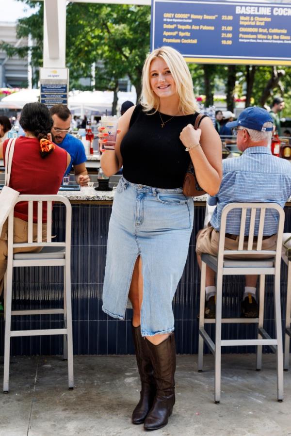 Gail Leblanc holding a Ho<em></em>ney Deuce cocktail at the 2024 US Open Champio<em></em>nships in Flushing, New York