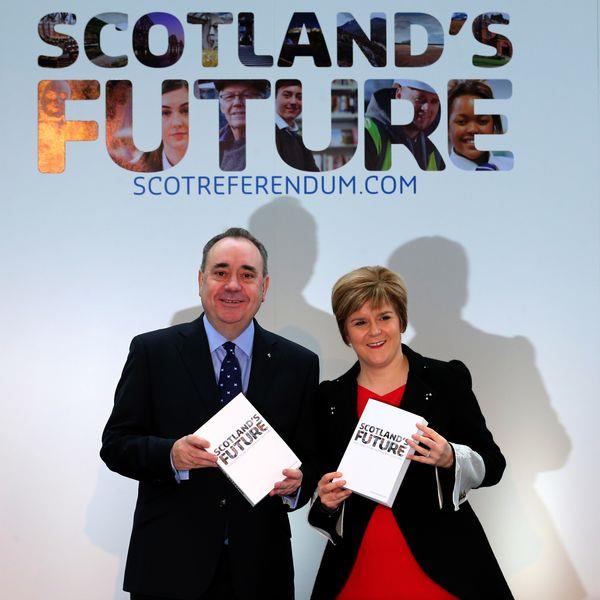 Scotland's First Minister Alex Salmond and Deputy First Minister Nicola Sturgeon hold copies of the White Paper after it was launched at the Science Centre in Glasgow. The Scottish Government has published its white paper on independence, outlining how it believes a Yes vote in next year's referendum could pave the way for a new era for the nation.