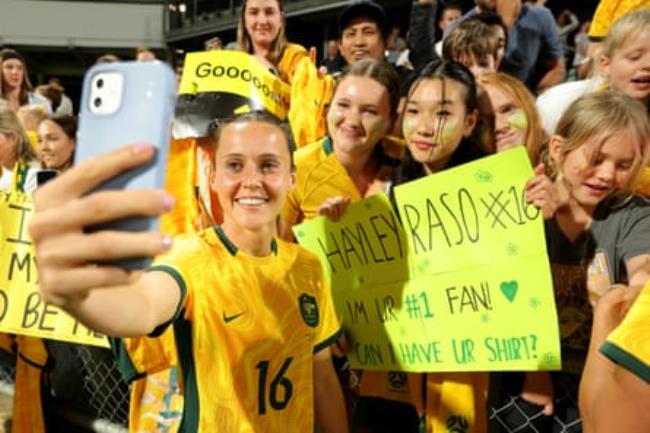 Hayley Raso of Australia takes a selfie with fans in 2023