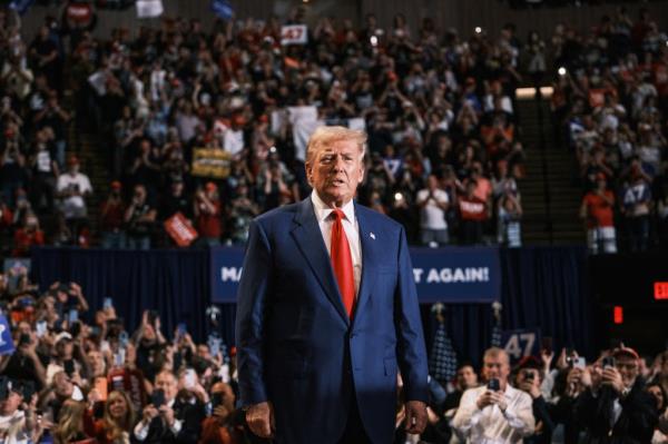 Former US president Do<em></em>nald Trump holds at a campaign rally at Nassau Coliseum in Hempstead, Long Island. 
