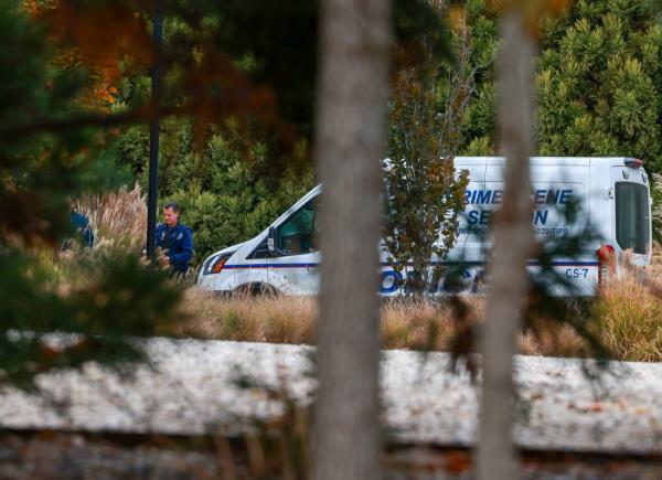 Police at the Shou Sugi Ban House in Water Mill.