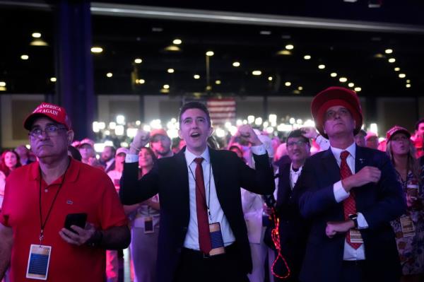 Trump supporters celebrating Trump's election win at the Palm Beach Co<em></em>nvention Center.