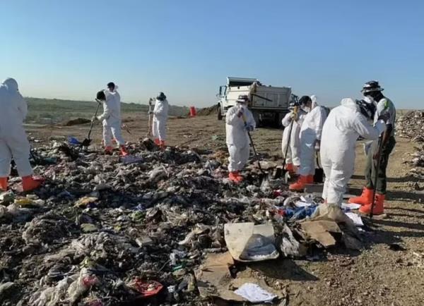 Authorities co<em></em>nduct a massive search at the landfill.