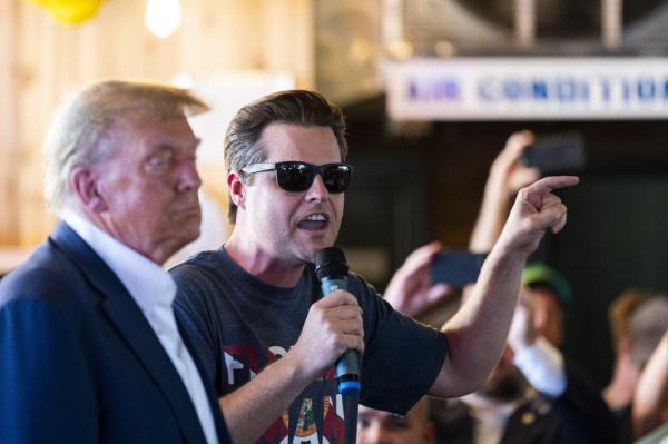 Gaetz and Trump at the Steer N' Stein bar during the Iowa State Fair in Des Moines, Iowa, US, on Saturday, Aug. 12, 2023. 