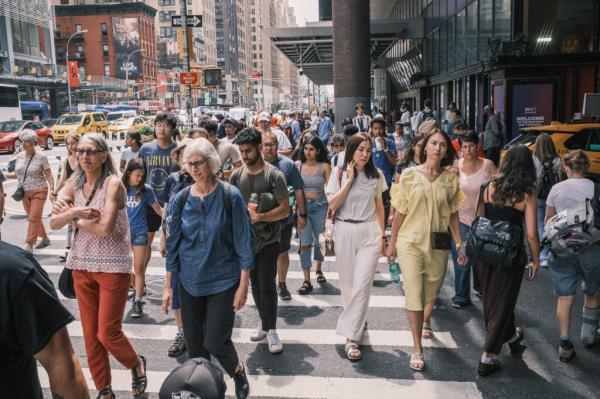 People walking street in midtown Manhattan.