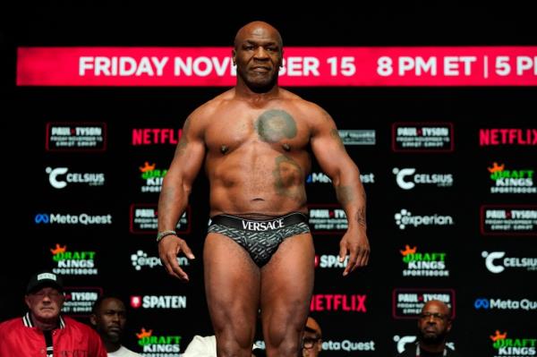 Tyson at the weigh in wearing nothing other than small Versace boxers