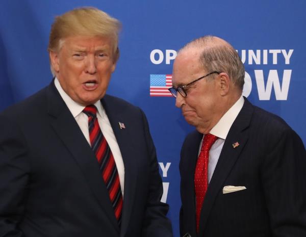 Do<em></em>nald Trump and Larry Kudlow at co<em></em>nference on April 17, 2019.