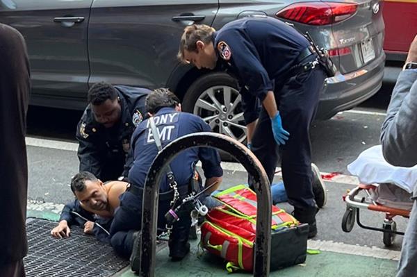 NYPD officers respo<em></em>nding to a shooting scene on November 7, 2024, at Columbus Ave and W 69th, tracking a suspect into 72nd street subway station; Jimoh Ibrahim present