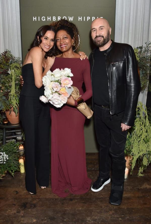 Meghan, Duchess of Sussex, Kadi Lee, and Serge Normant posing together at the Highbrow Hippie Launch Party in Venice, California.