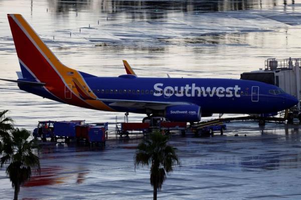 A Southwest Airlines jets sits at a gat at Orlando Internatio<em></em>nal Airport on Oct. 11, 2021.