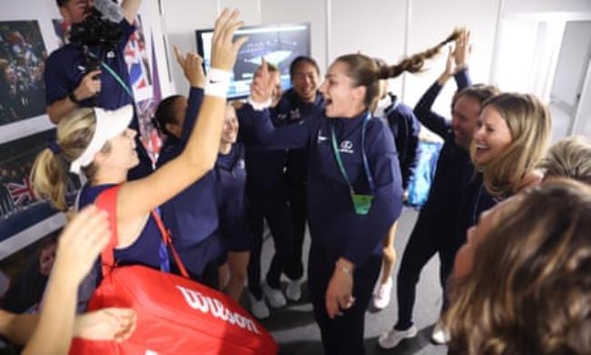 Olivia Nicholls leads the celebrations in the dressing room after Katie Boulter won her singles match against Leylah Fernandez of Canada.